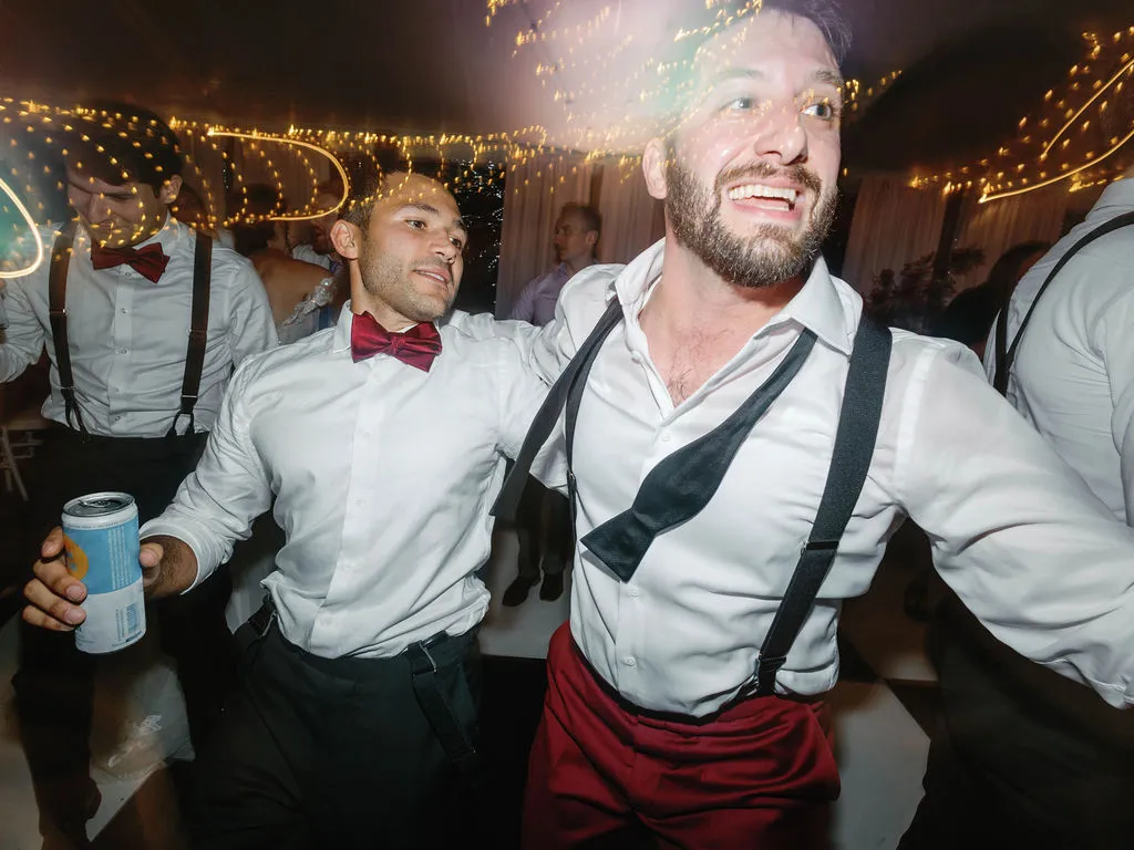 guys dancing at wedding