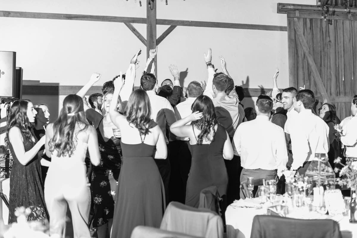 wedding guests packed on dance floor