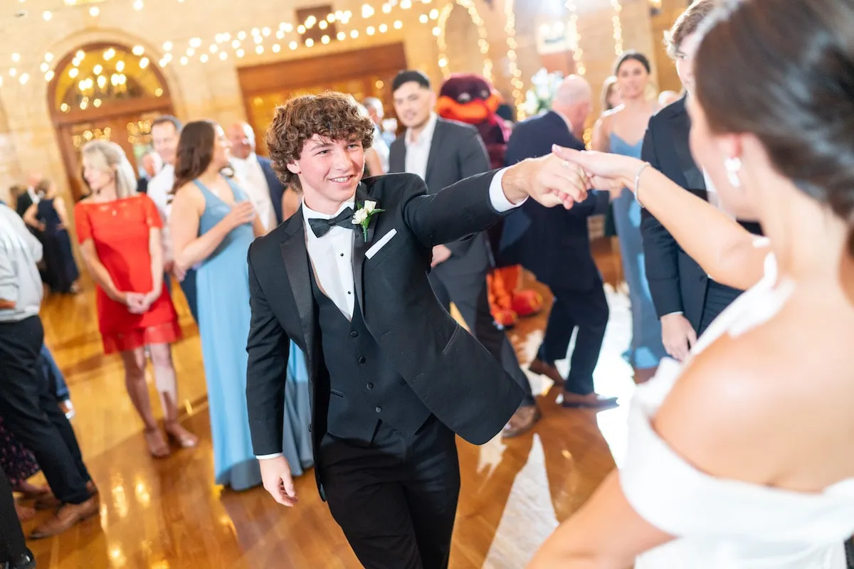 groom dancing with bride