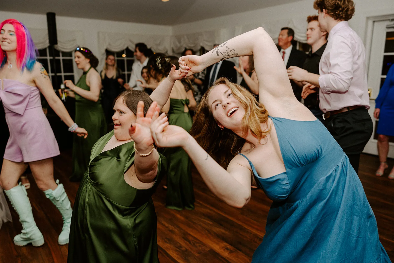 women dancing at wedding
