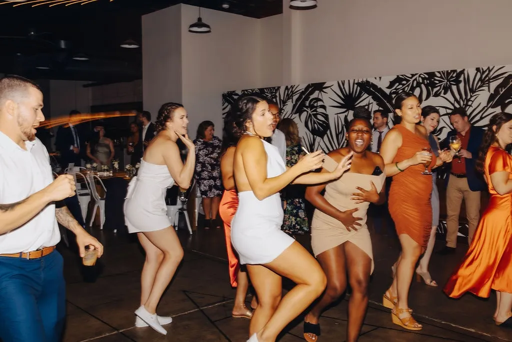 brides dancing with guests