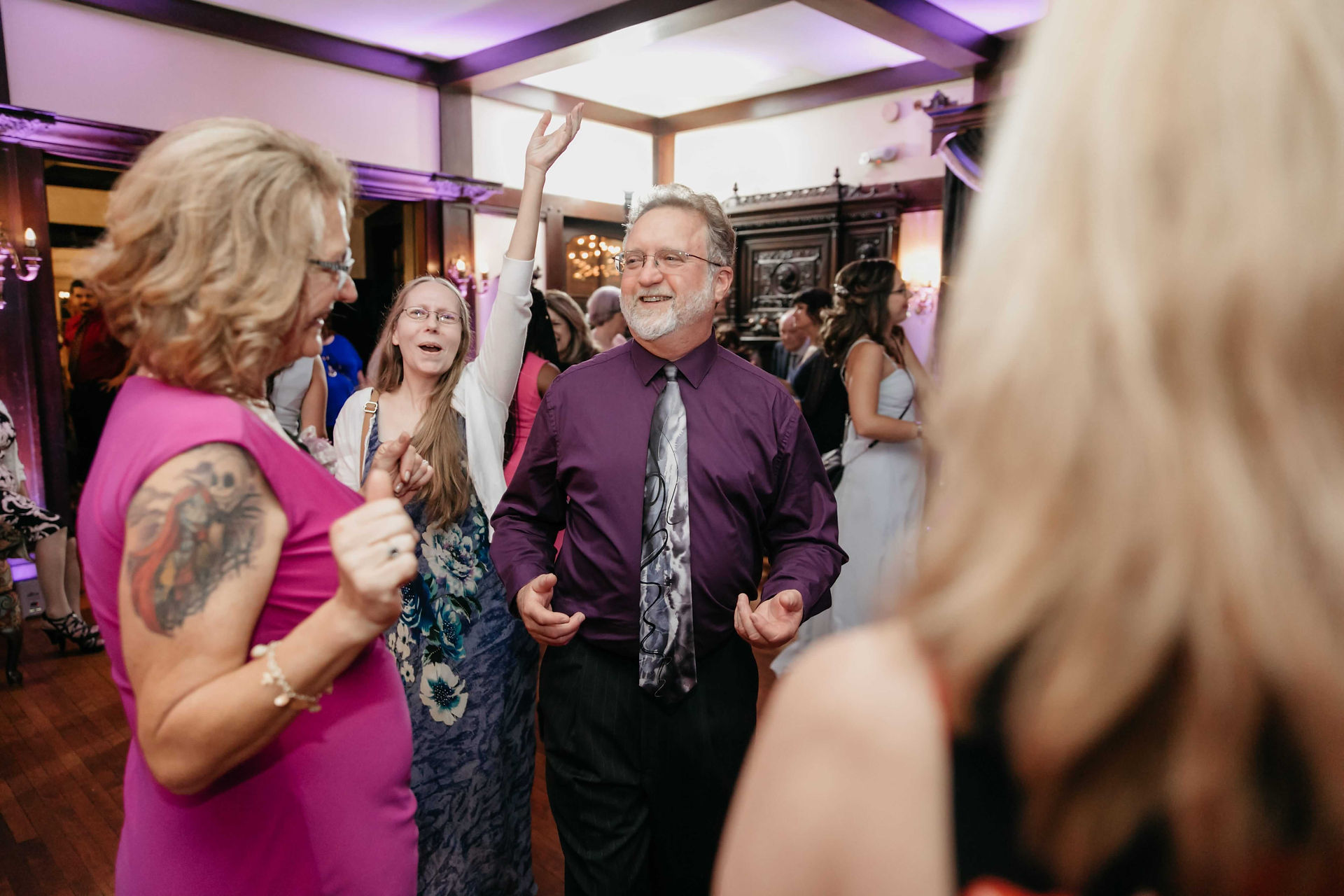 guy in purple shirt dancing