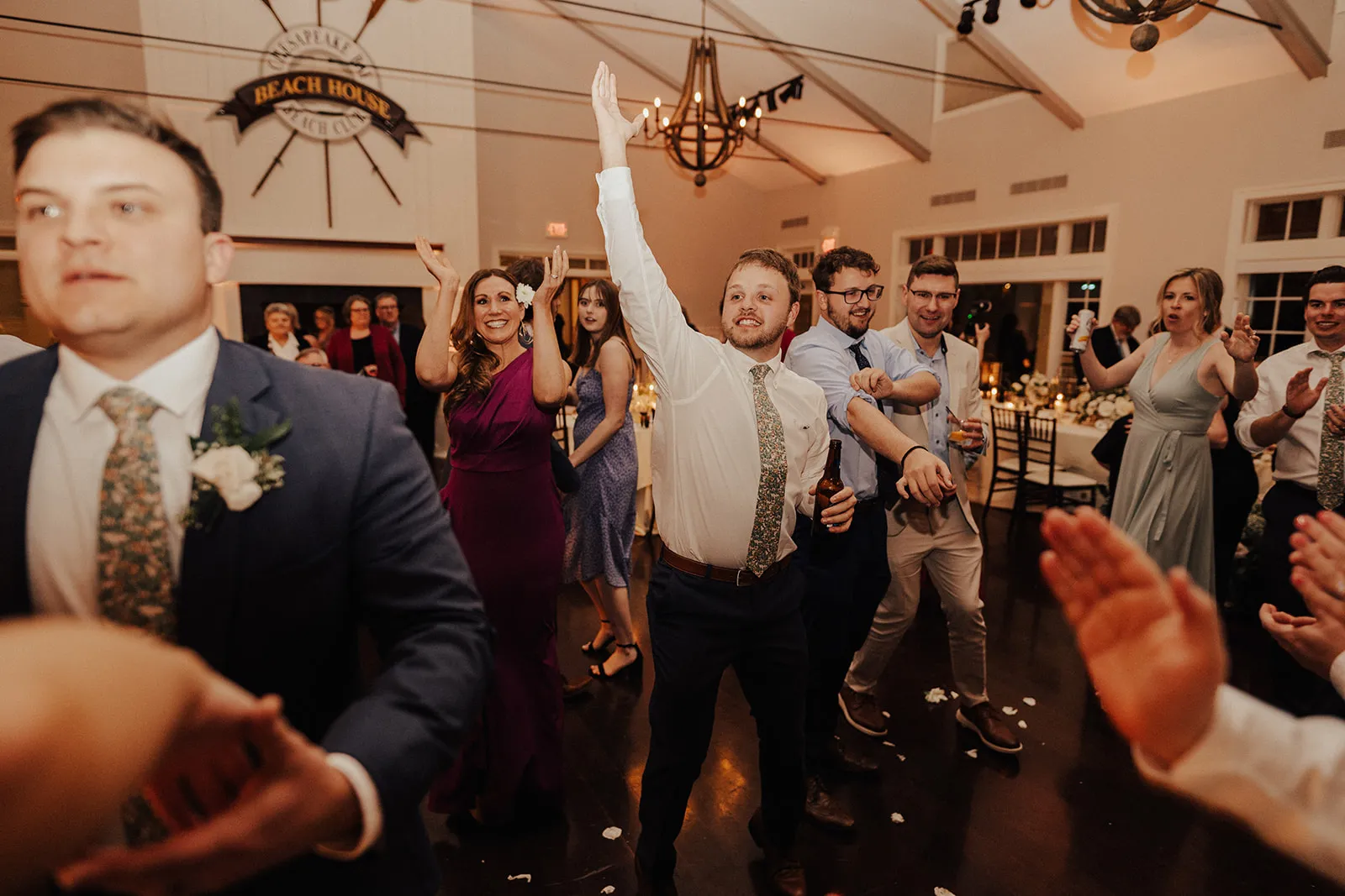 guy dancing with hand up