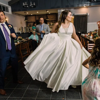 bride dancing with guests