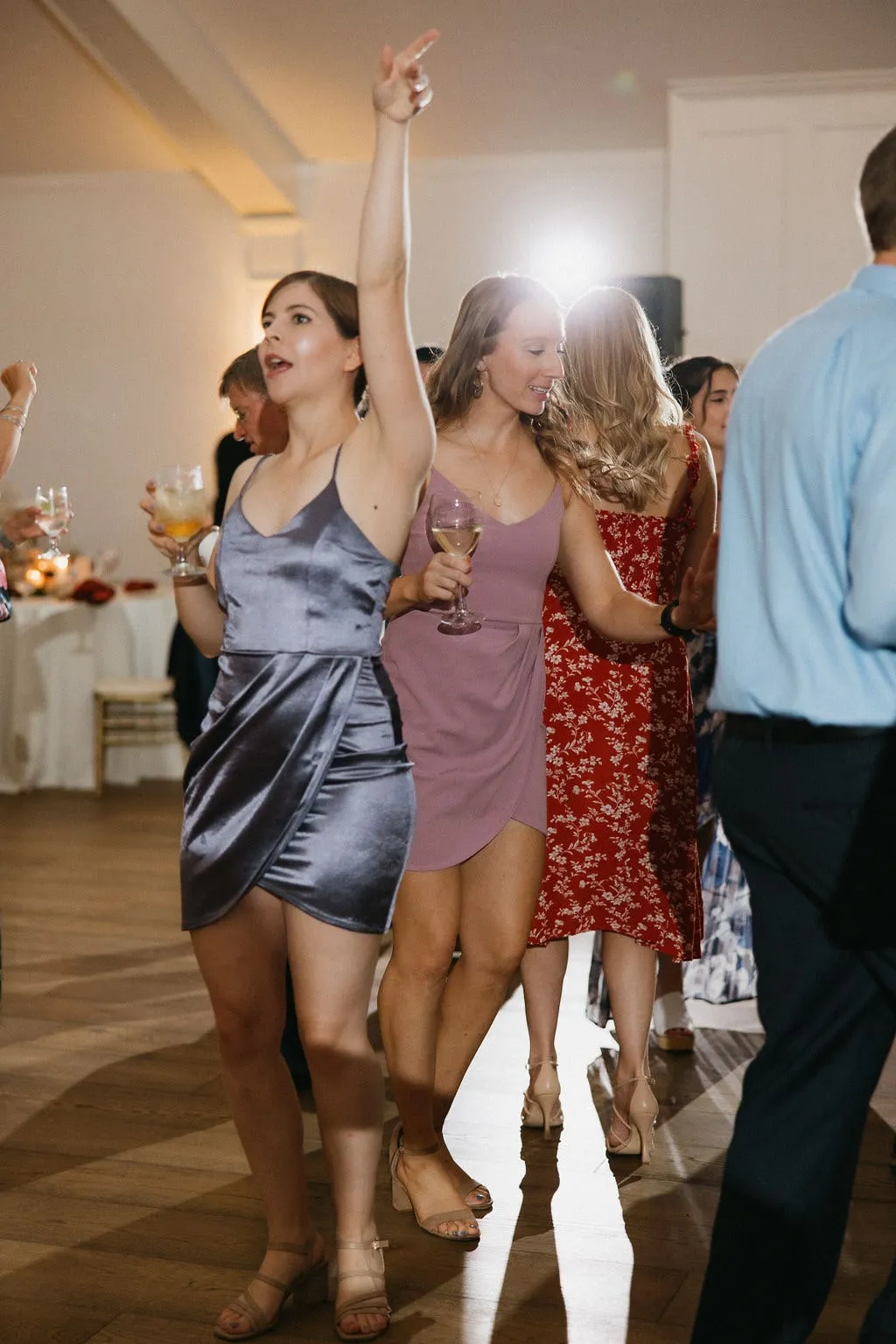 women dancing at wedding