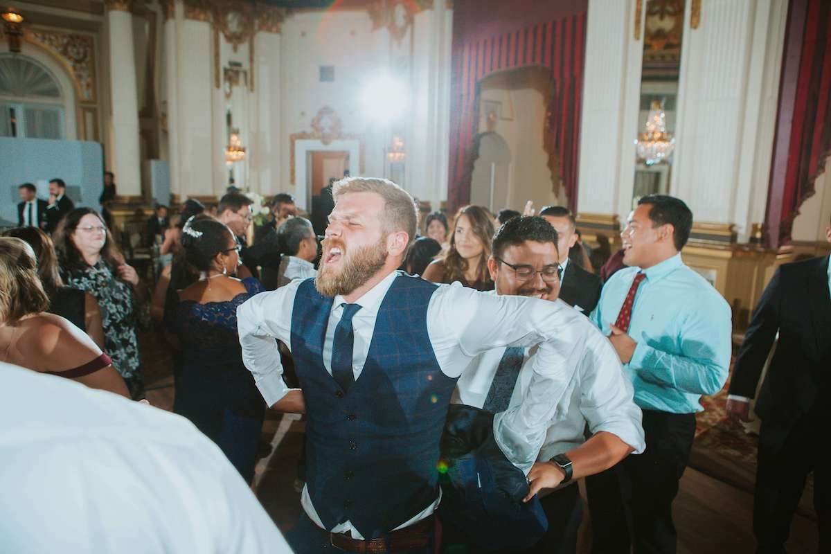 guys dance at wedding