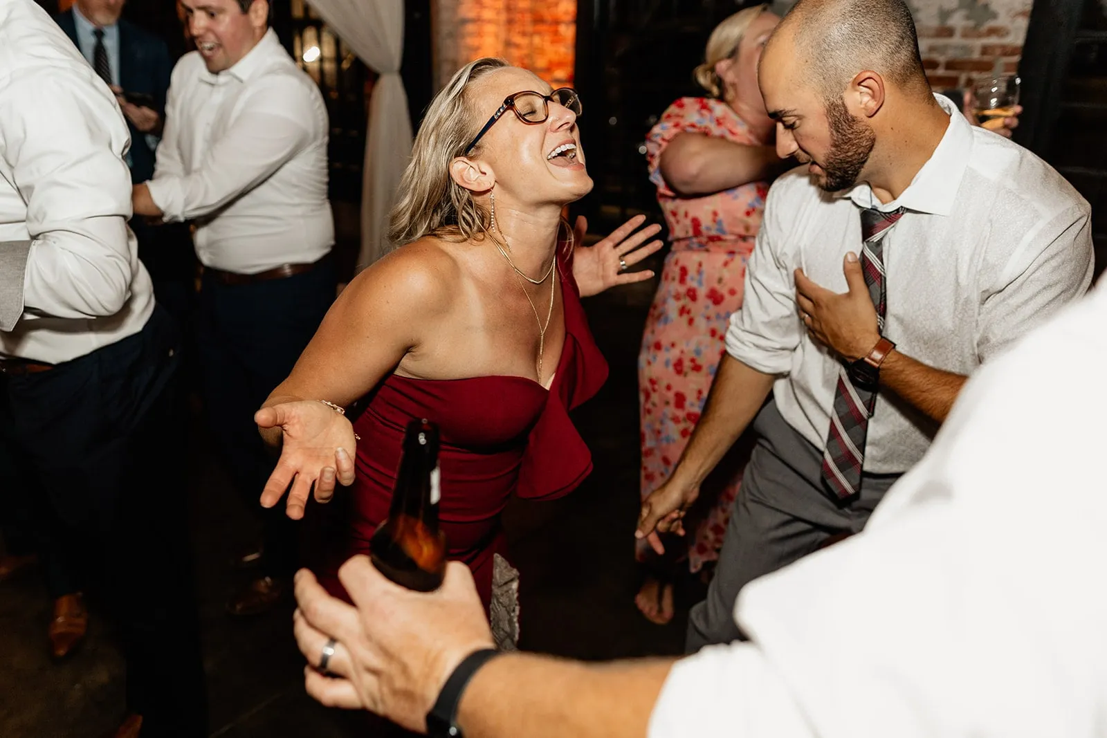 woman in red dress dancing