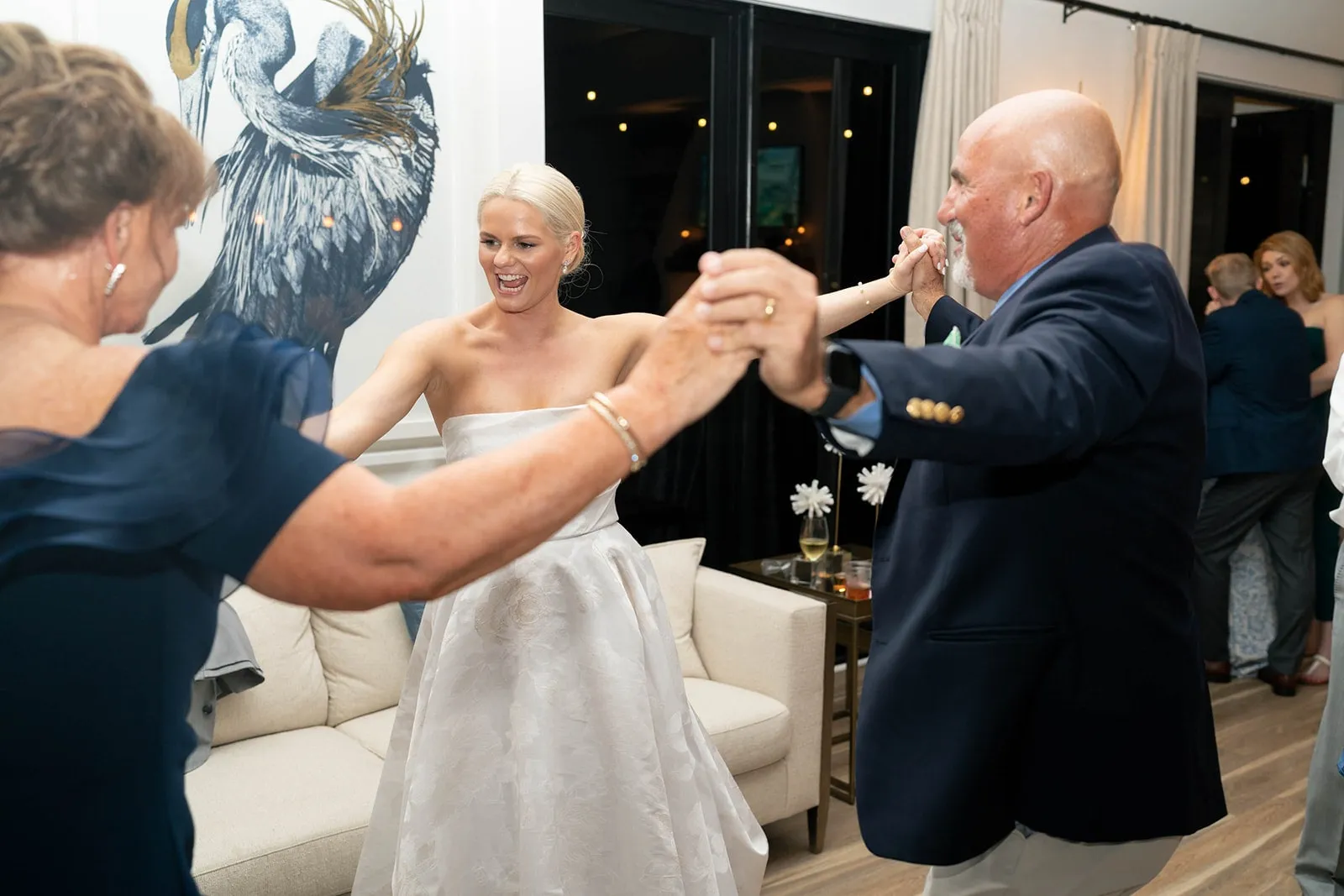 bride dancing with older guests
