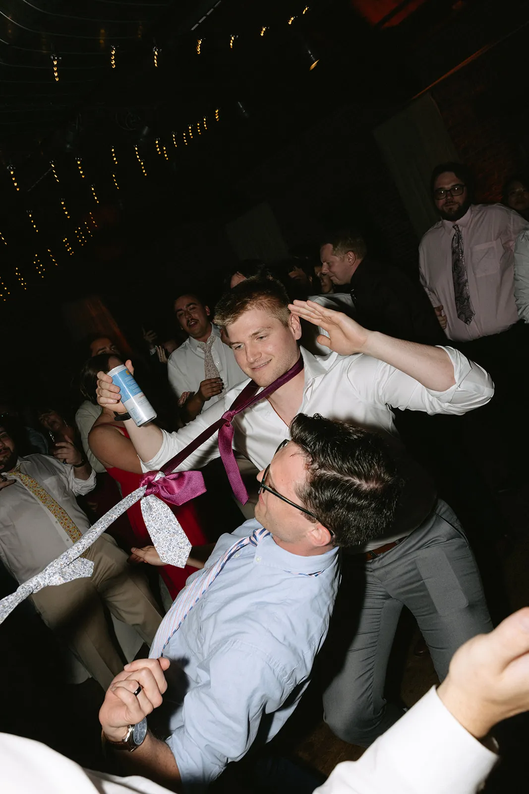 guys doing limbo under ties