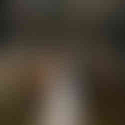 bride and groom kiss during first dance