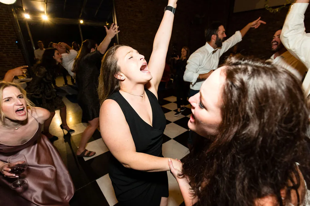 women dancing at wedding