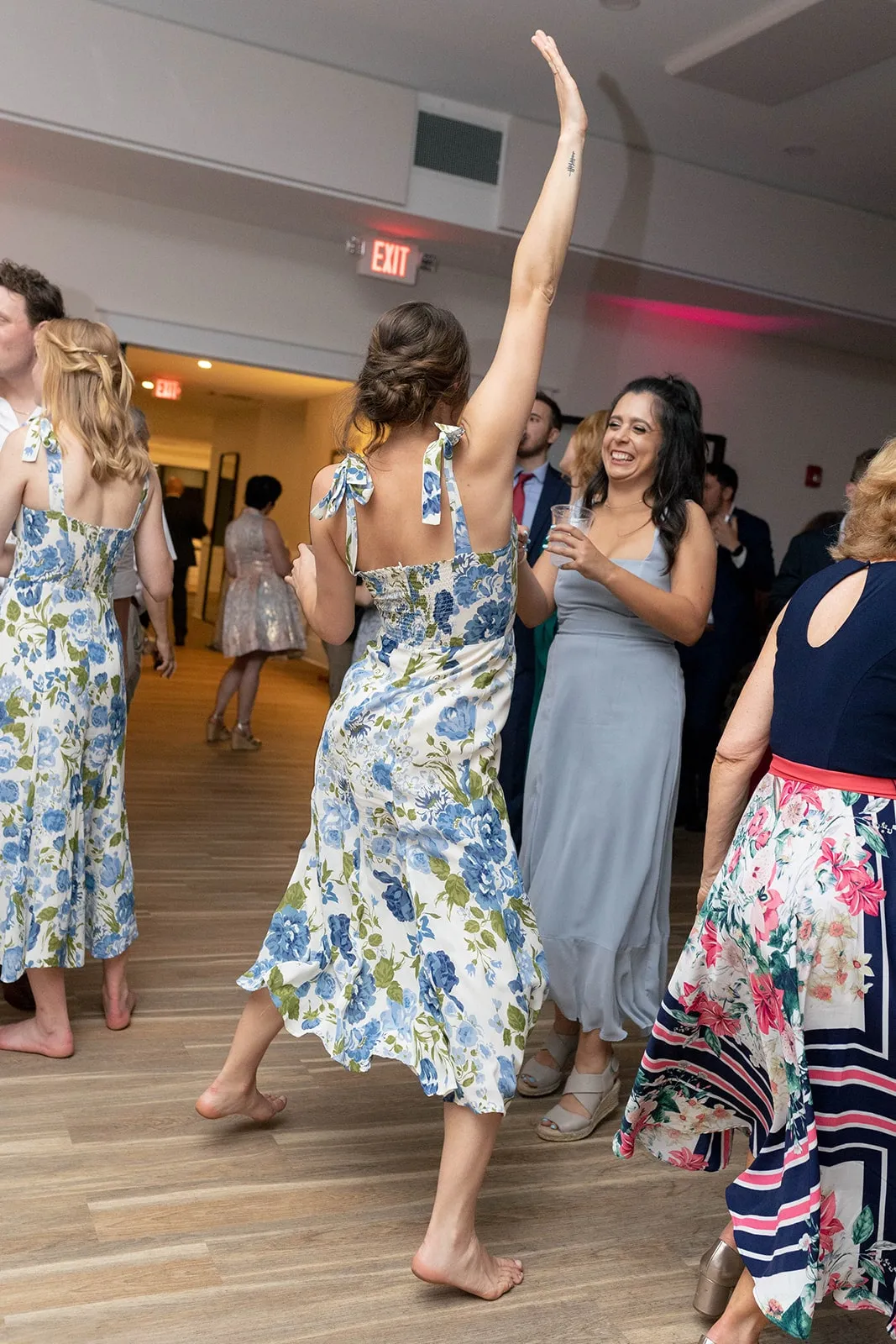 bridesmaid dancing with arm up