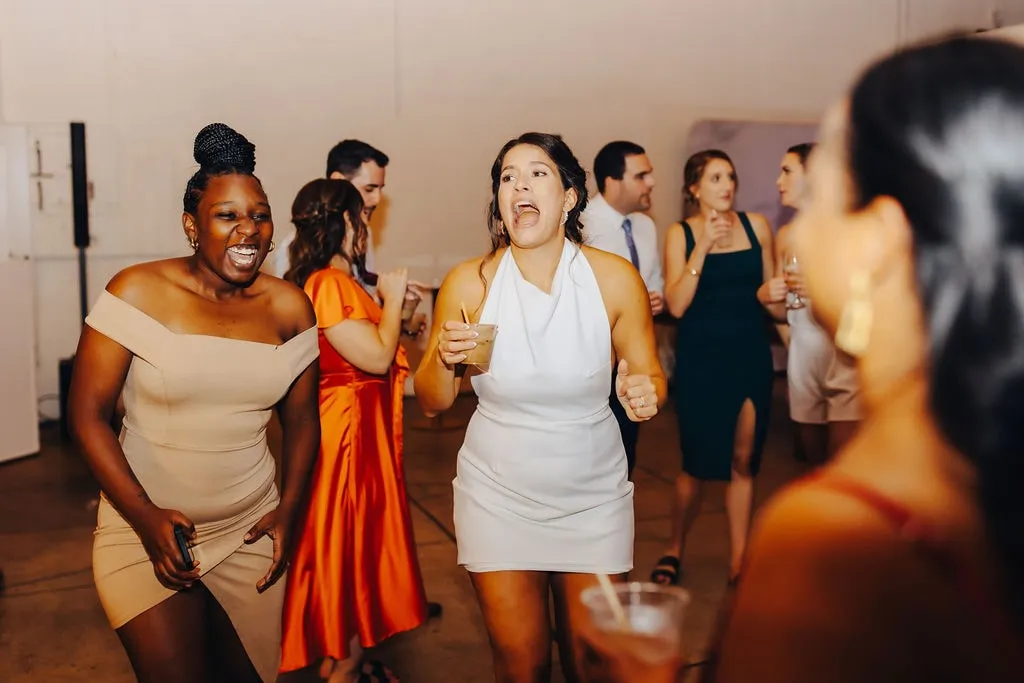 bride dancing with guests