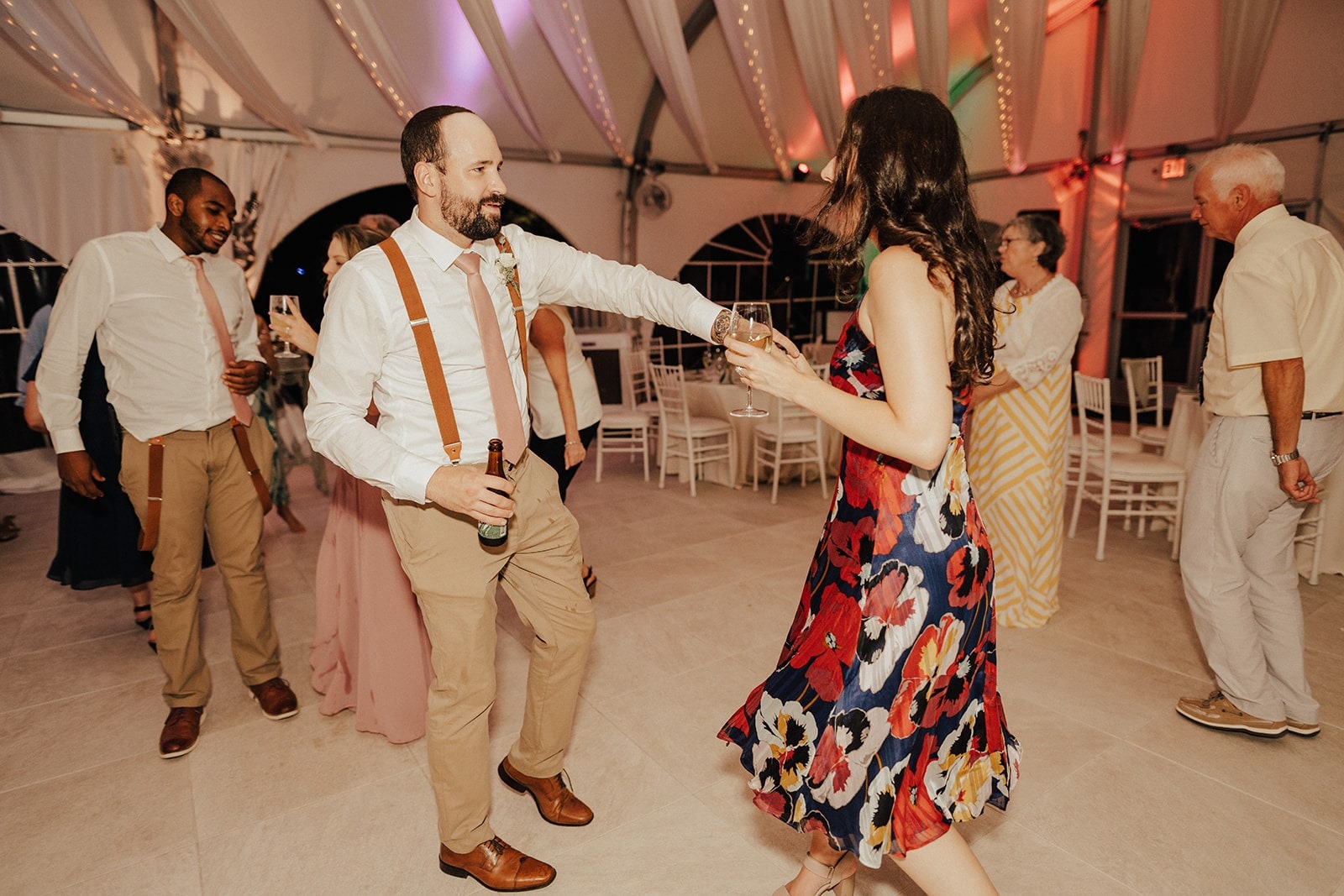 groomsman and woman dance