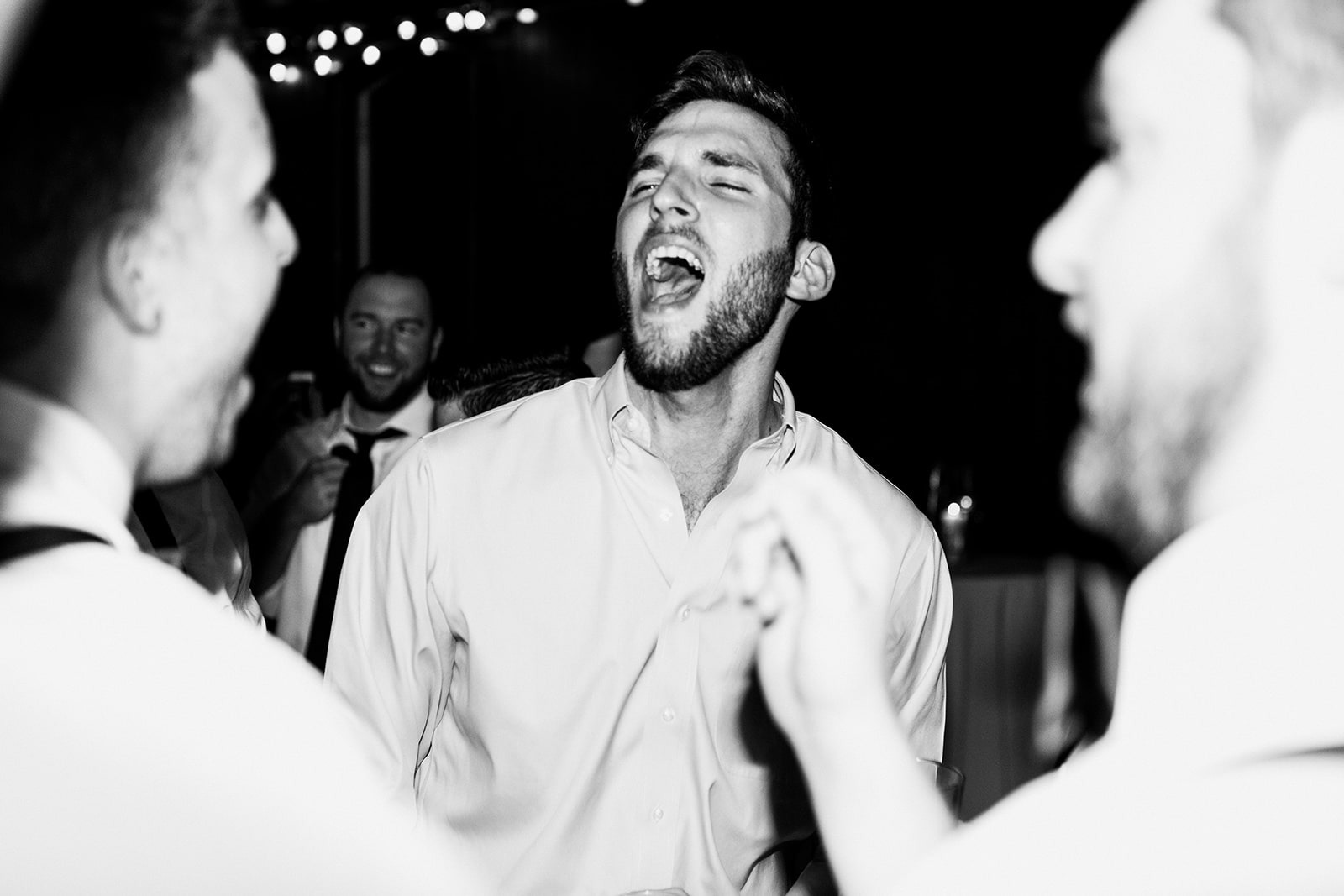 guys dancing at wedding