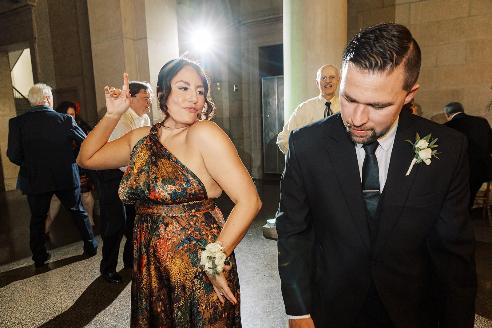woman and man dancing at wedding