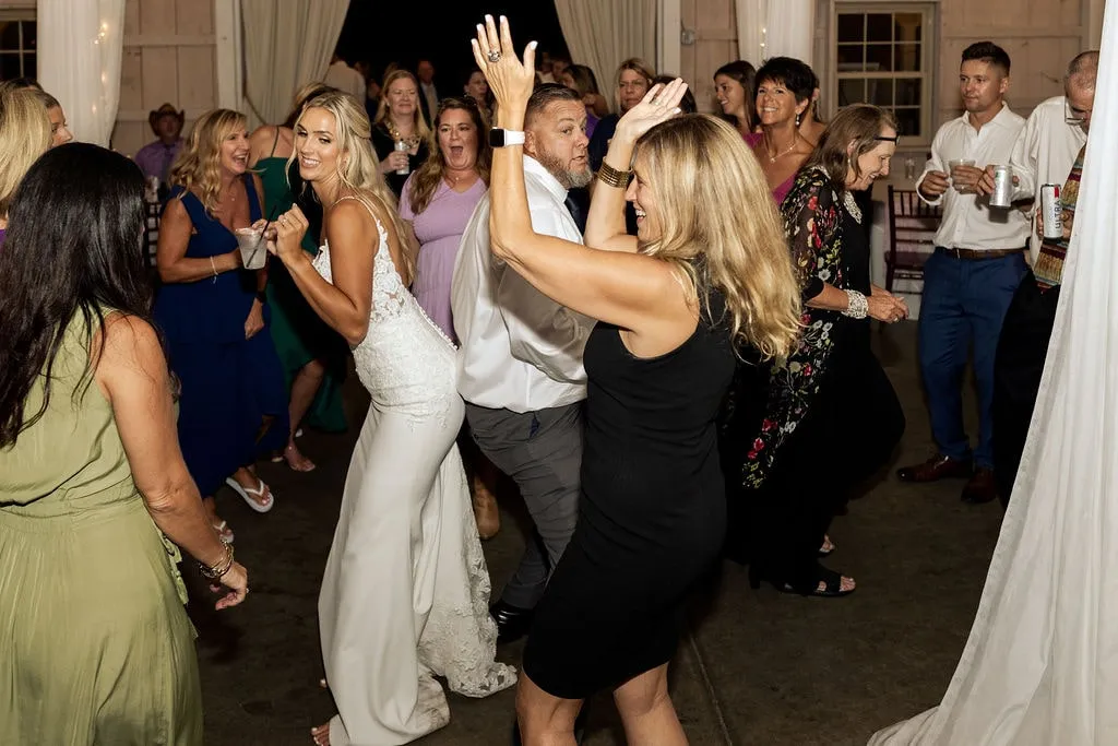 bride dancing with guests