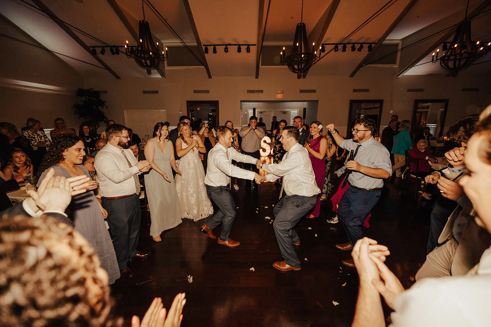 guys dancing in center of circle