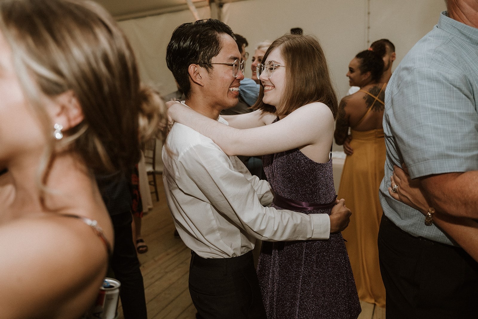 nerdy couple slow dancing at wedding