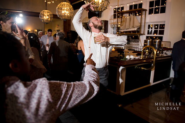 guy holding drink and dancing at chesapeake bay beach club