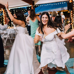 bridesmaid dancing at wedding