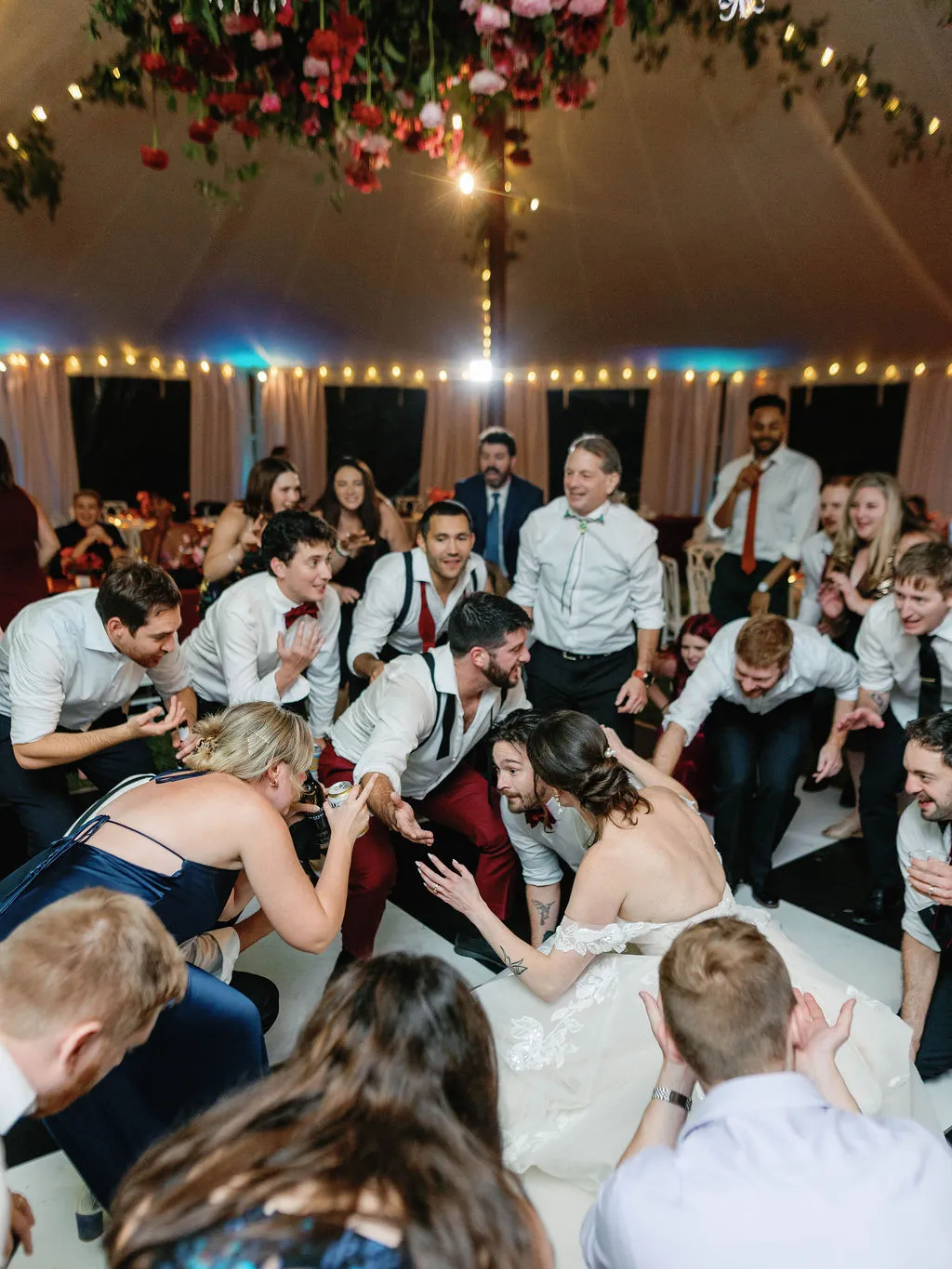guests dancing low at wedding