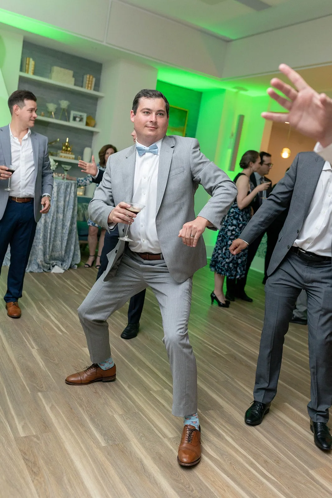 groom dancing at wedding