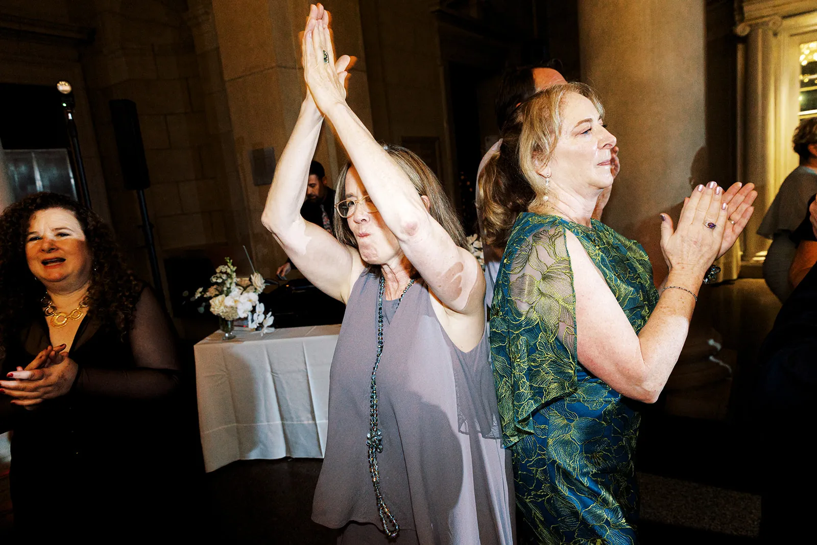 two women dancing at wedding