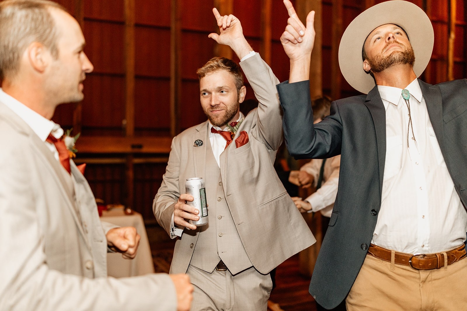 guys and groomsman dancing at wedding