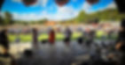 band performing on the outdoor stage looking out over shaw park