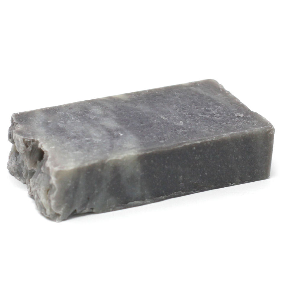 Handmade Dead Sea Mud soap wrapped in waxed paper, designed to purify and rejuvenate skin.