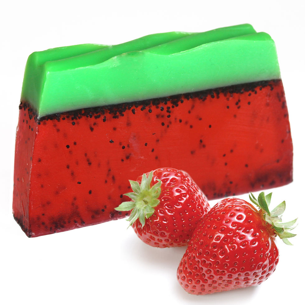 Strawberry Soap Slice with a sweet, fruity-green fragrance, wrapped in waxed paper with an ingredients label.