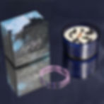 Zodiac Crystal Candle for Aquarius with gemstone bracelet featuring amethyst, lapis lazuli, and hematite.