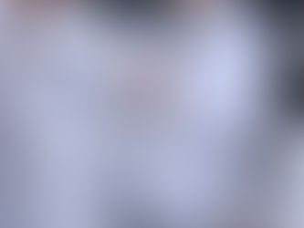 Young Six Blades Jiu-Jitsu student receiving stripe on her grey white belt