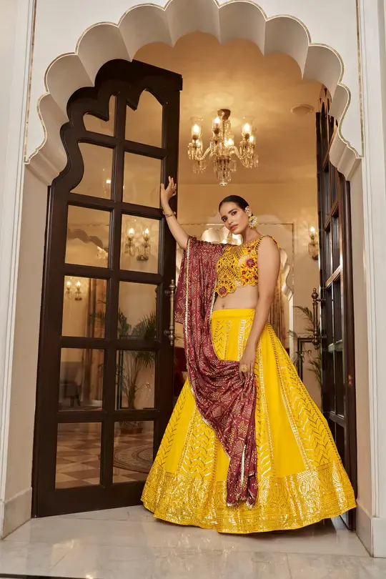 Buy Yellow With Maroon Color Embroidered Semi Stitched Bridal Lehenga Choli