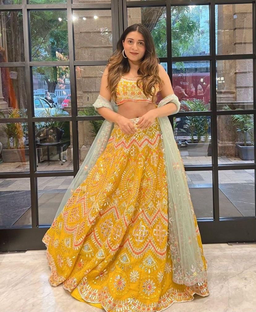 Buy yellow foil mirror work lehenga choli for haldi