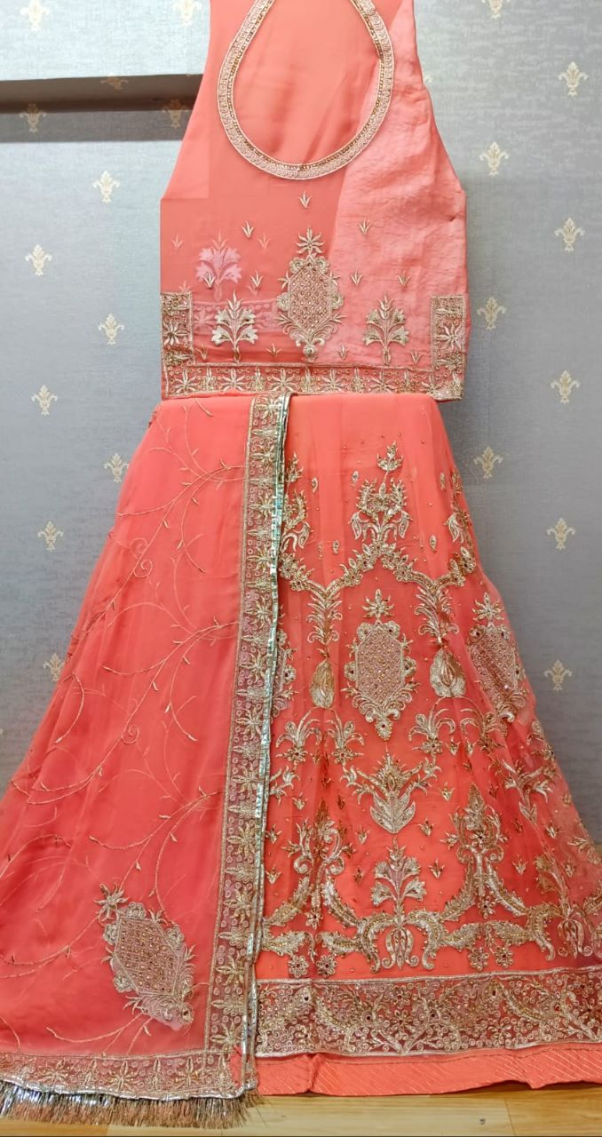 Trending peach color beautiful rajputi poshak for wedding