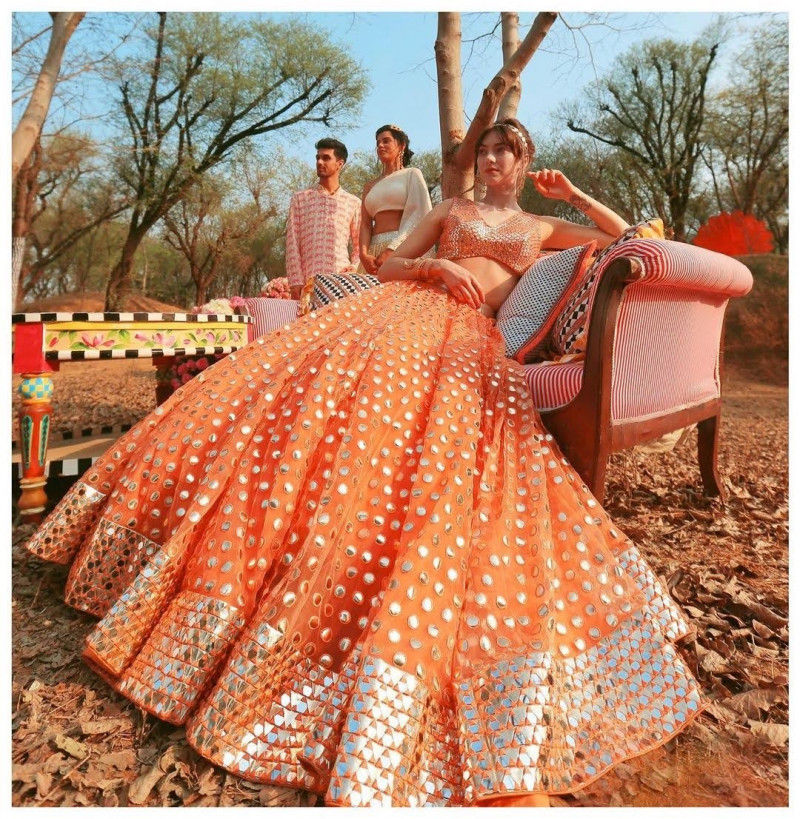 Latest Organza Fabric Orange  Colored Mirror Embroidery Work Lehenga