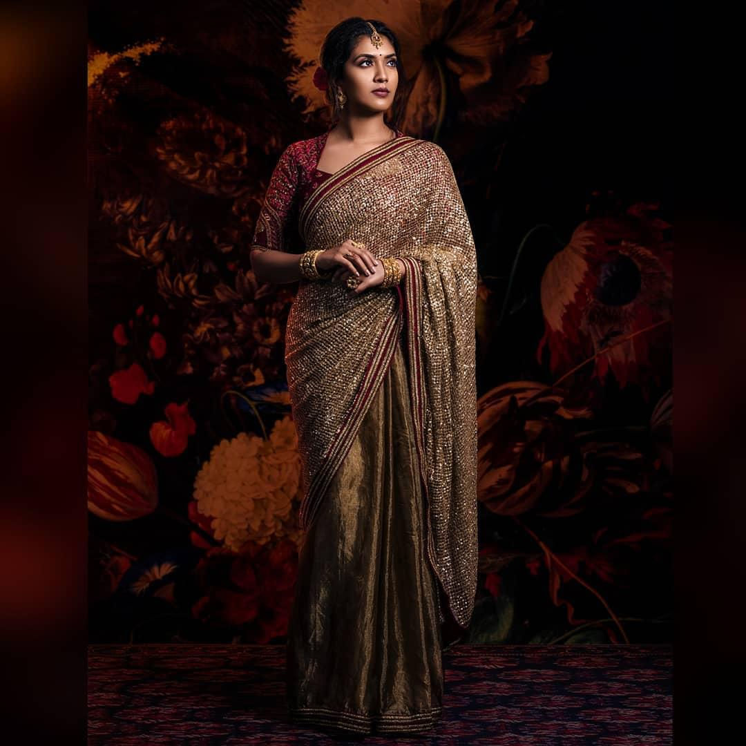 Alluring Heavy Golden colour Sequence Saree
