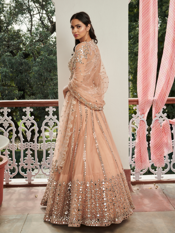 Thumbnail: Buy Presenting Designer Peach Color Heavy Mirror Embroidery Work Lehenga