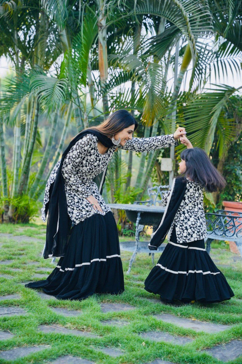 Thumbnail: Buy Surpassing Black Colored Mother Daughter Matching Combo Dress