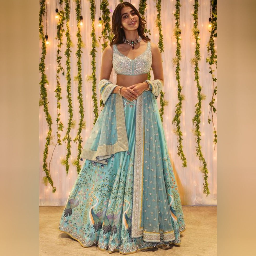 Bollywood stylish Pooja hegde Wear peacock style lehenga choli