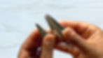 hand holding a number 16 and number 1M piping tip