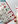 holding betty crocker decorating tips and decorating icing side by side