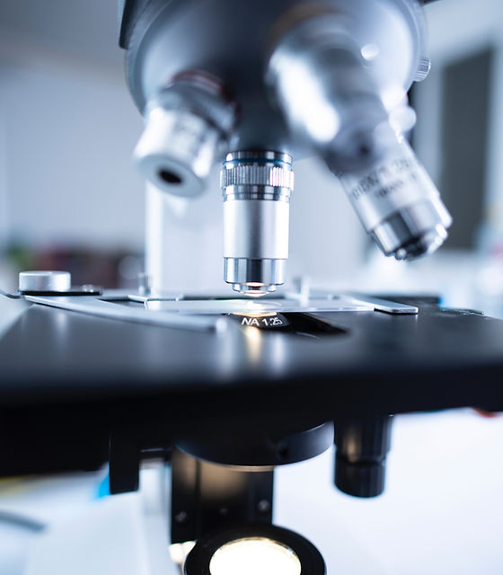 shallow-focus-photography-of-microscope-