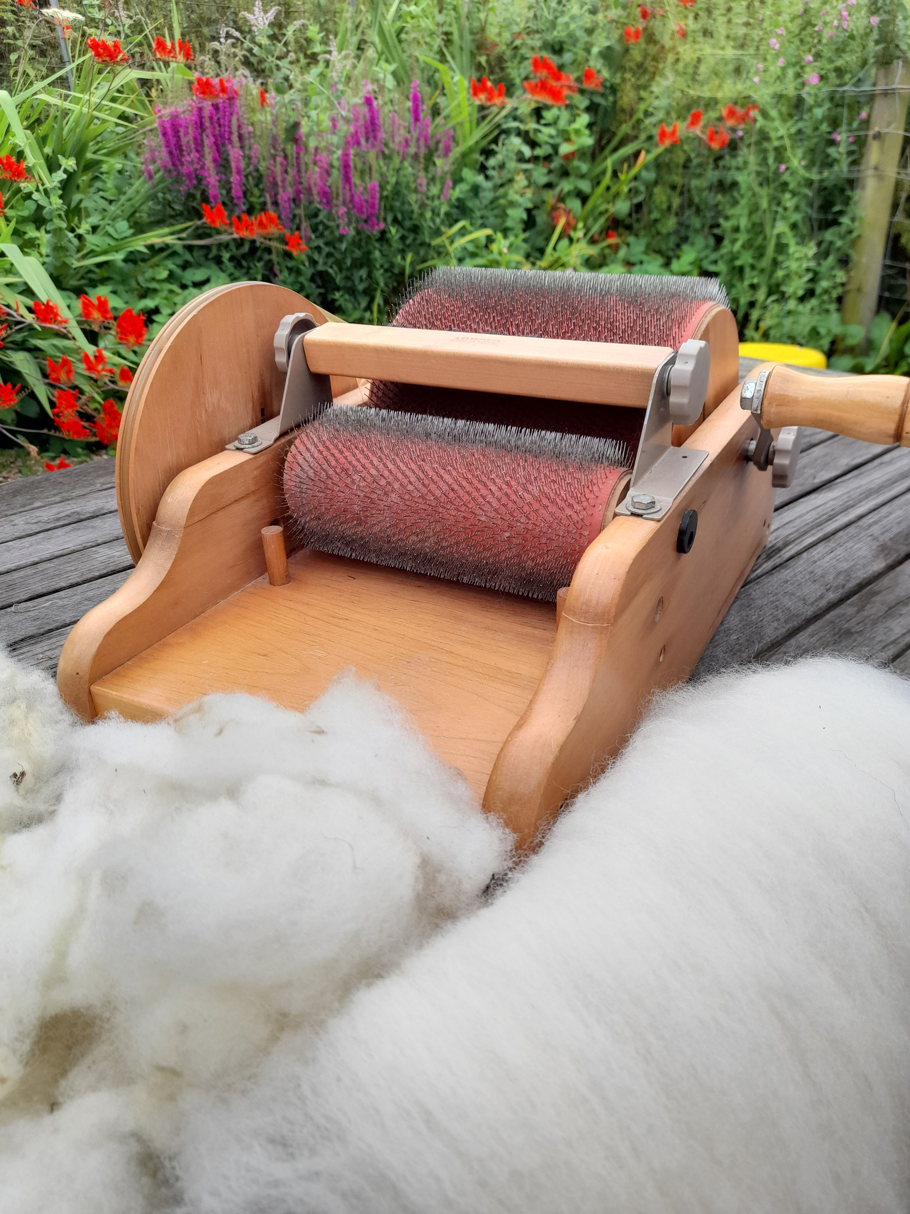 The Spinning Barn Logo with spinning wheel