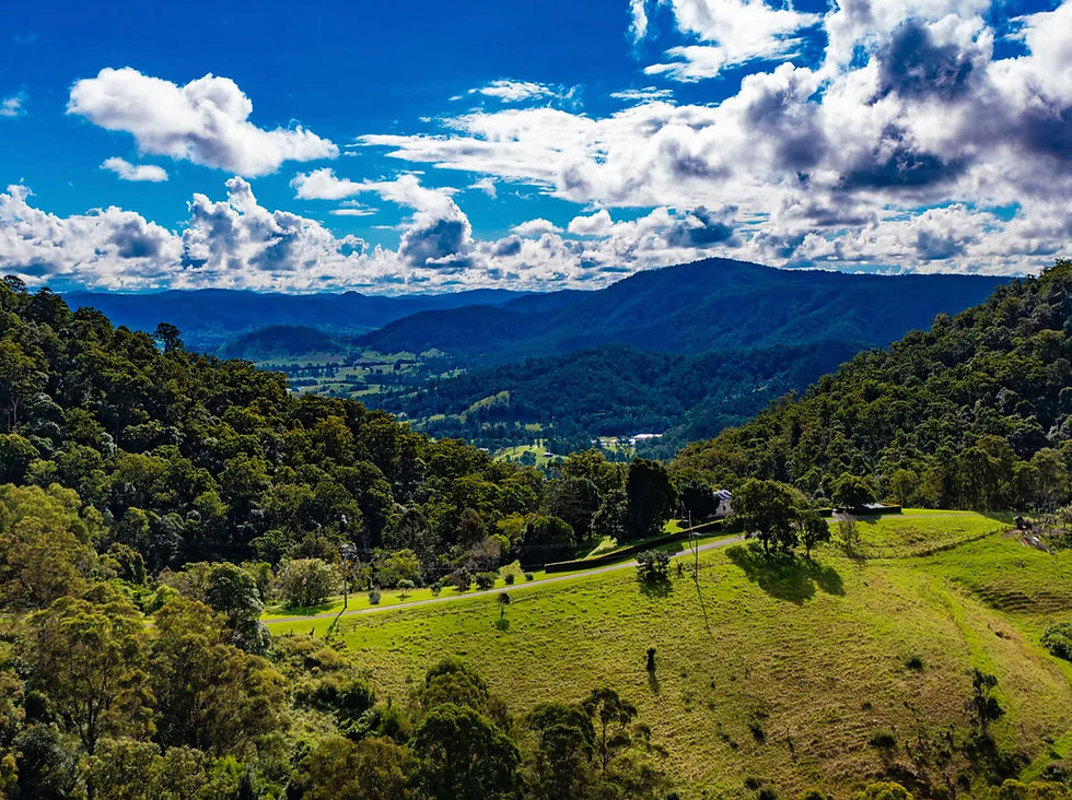 rolling hills and blue sky with clouds