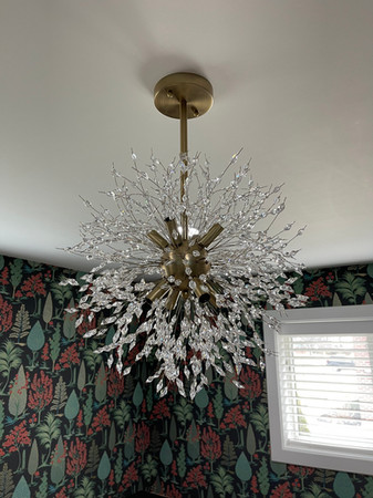 wallpapered walls and added center ceiling light