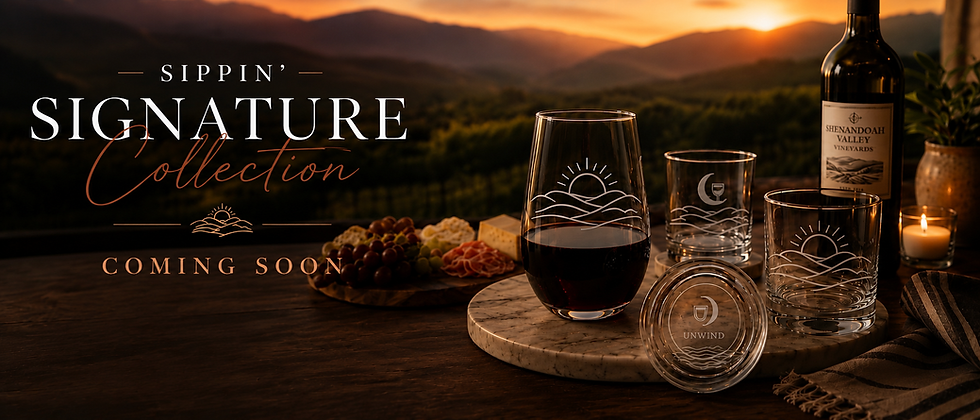 Luxury wine glassware collection display featuring etched stemless wine glasses, whiskey glasses, candlelight ambiance, and Shenandoah Valley vineyard scenery at sunset.