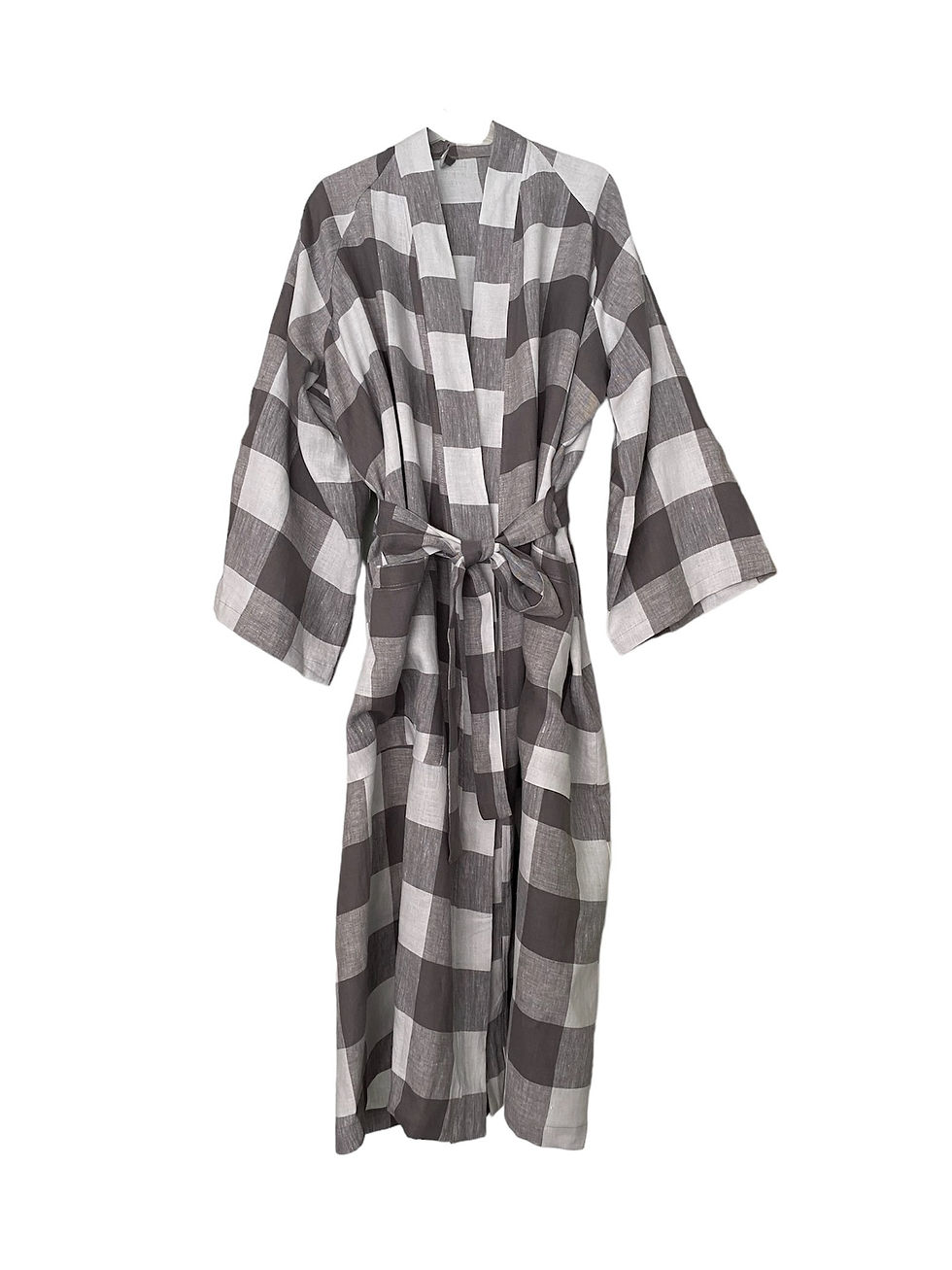 Photo of a grey checkered soft pure linen bathrobe. The robe features a comfortable, breathable linen fabric with a classic checkered pattern, offering a relaxed and stylish look for lounging at home.